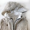 Puur Nepal vest gerstekorrel bodywarmer detail afritsbare capuchon