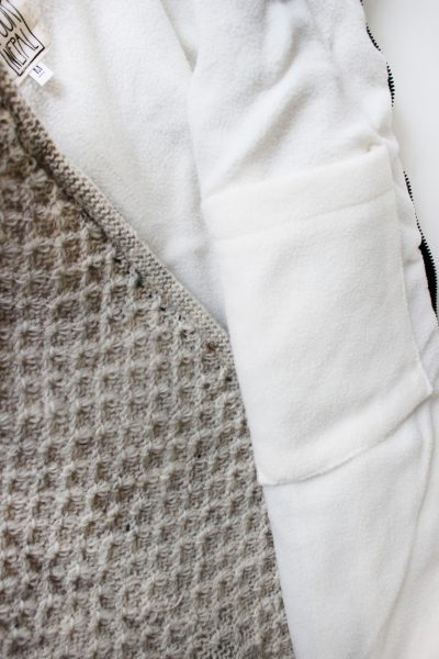 Puur Nepal gerstekorrel vest bodywarmer coat detail binnenzak Texelse Schapenboet